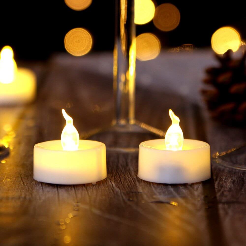 AGPtek 100 PCS Battery Operated Flickering Flameless Led Candle Tea Lights Amber Yellow Batteries Included Electric Fake Candles for Wedding Party